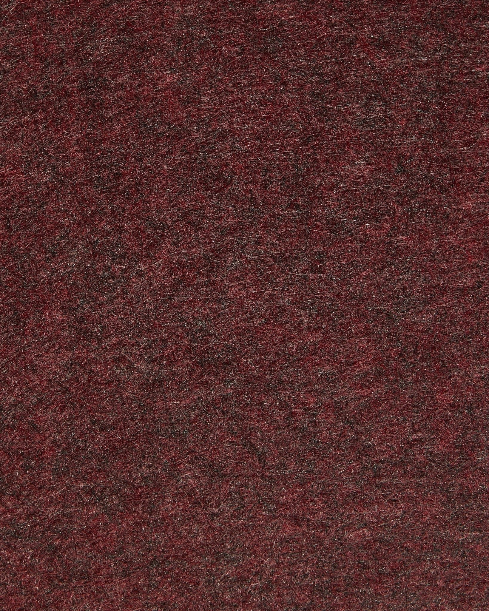 Nærbilde av WoodUpp Vigg | Felt Box / BM2 i ox red, med vekt på strukturert akustisk filt med myke nyanser og synlige fibre.